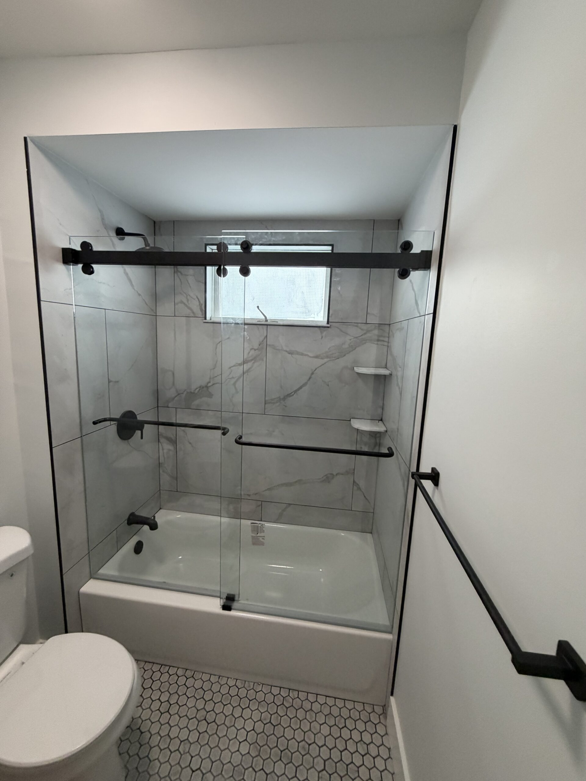 Frameless shower door installation
