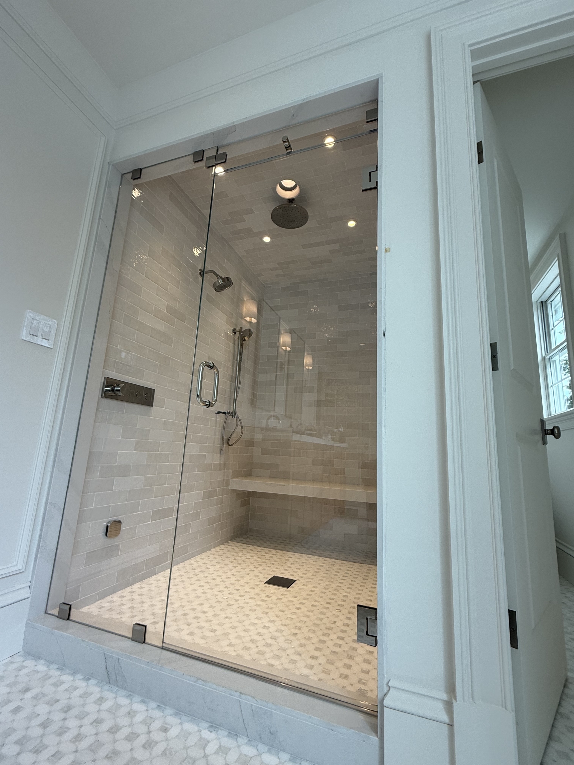 Custom glass steam shower enclosure installed in Greater Boston by LUXE Glass